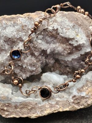 Wire wrapped bracelet with synthetic stones