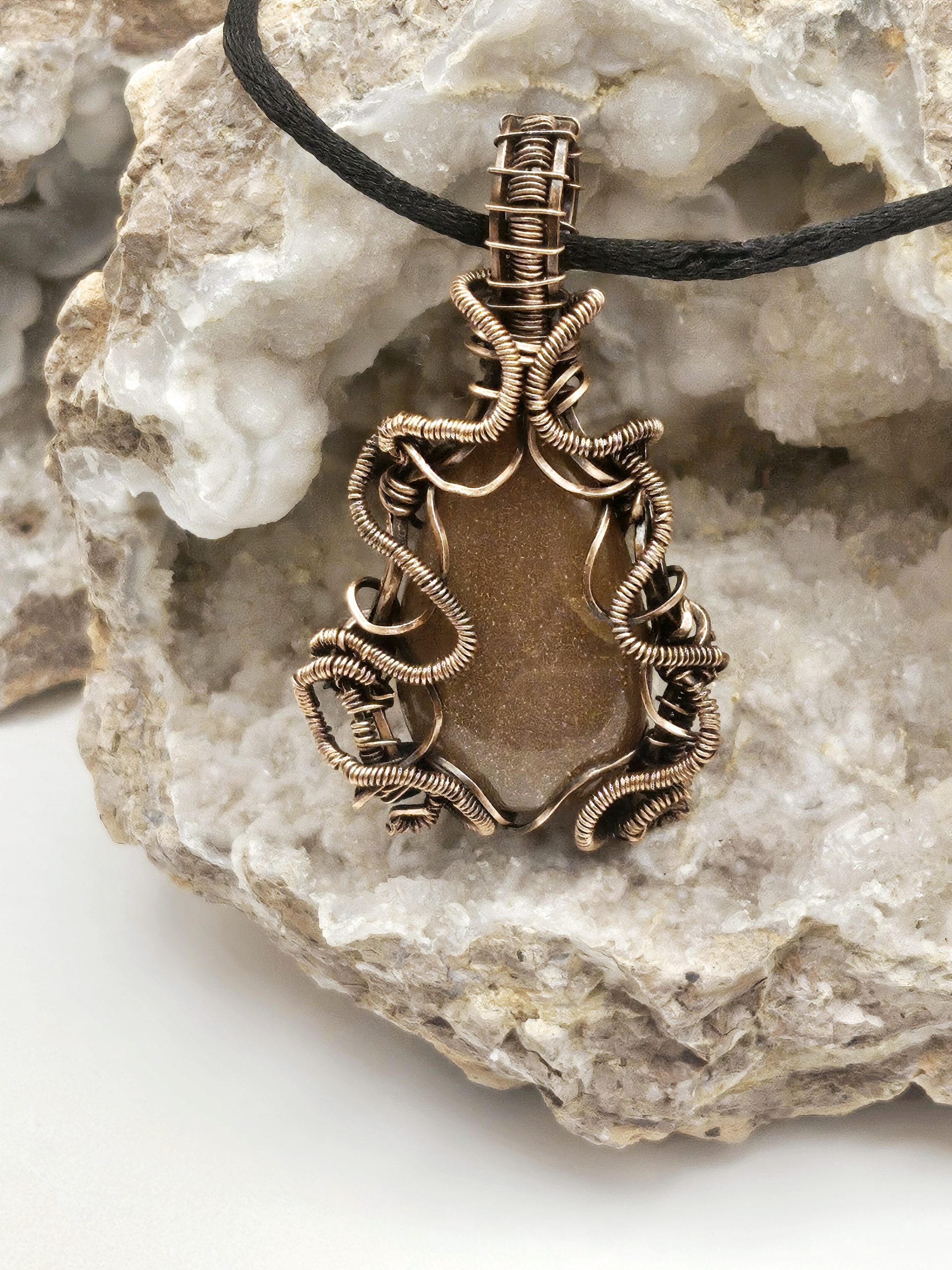 Peach Moonstone in oxidized Copper wire