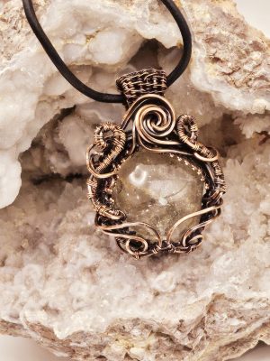 Clear Quartz in Oxidized copper wire